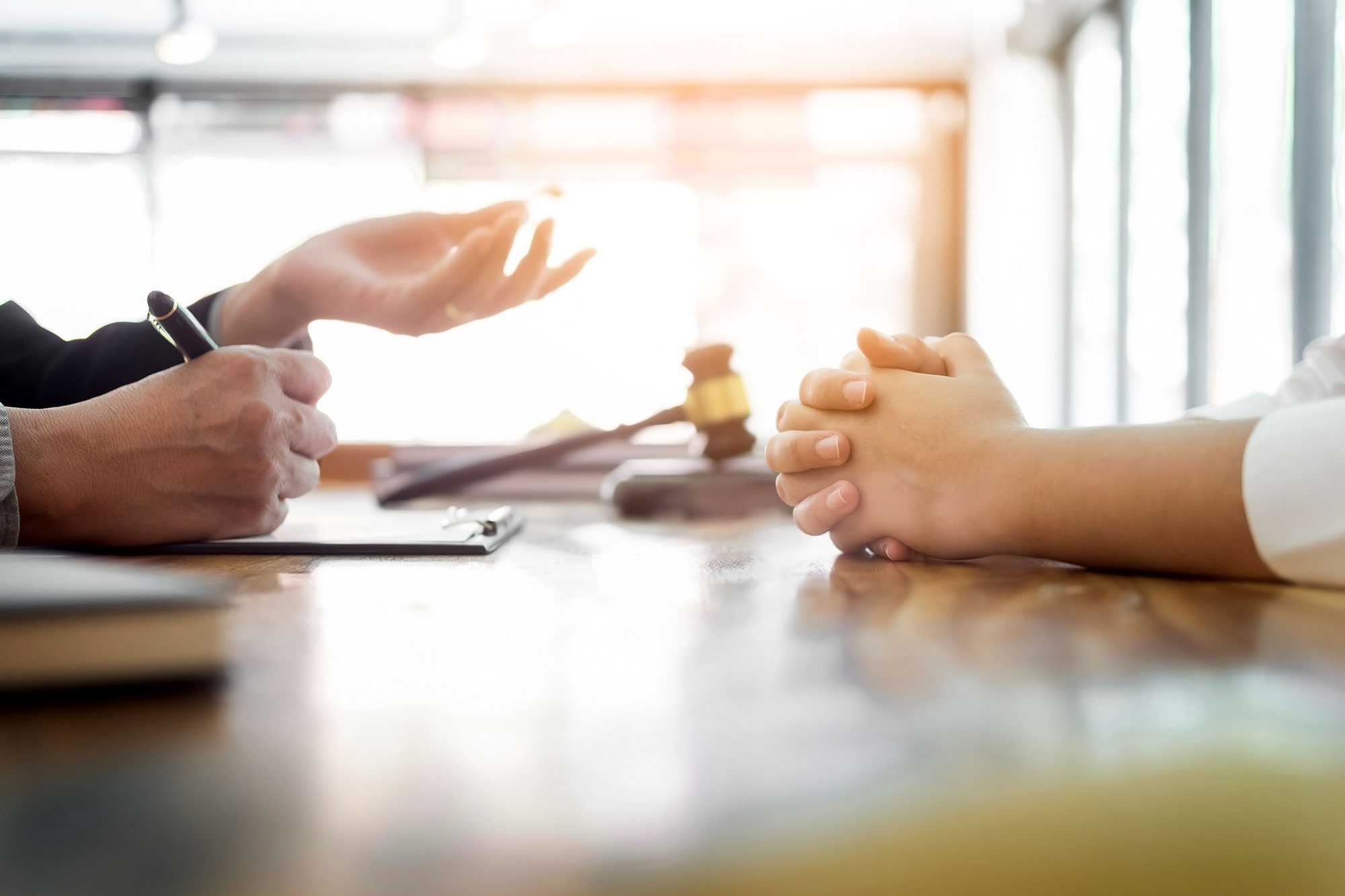 Person Explaining with Hands Steps to Lawsuit in Arizona
